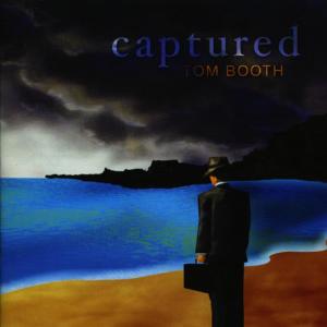 ดาวน์โหลดและฟังเพลง Captured พร้อมเนื้อเพลงจาก Tom Booth