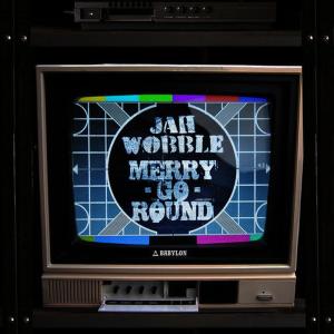 ดาวน์โหลดและฟังเพลง Merry Go Round (Dub Mix) พร้อมเนื้อเพลงจาก Jah Wobble