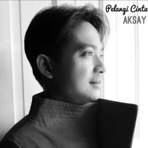 Dengarkan Pelangi Cinta lagu dari Aksay dengan lirik