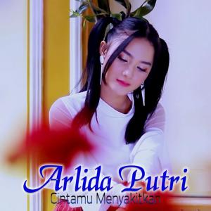 Listen to Cintamu Menyakitkan song with lyrics from Arlida Putri