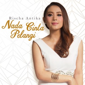 Listen to Nada Cinta Pelangi song with lyrics from Rischa Antika
