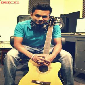 Listen to Anbe Theivam song with lyrics from Edwin S.A.