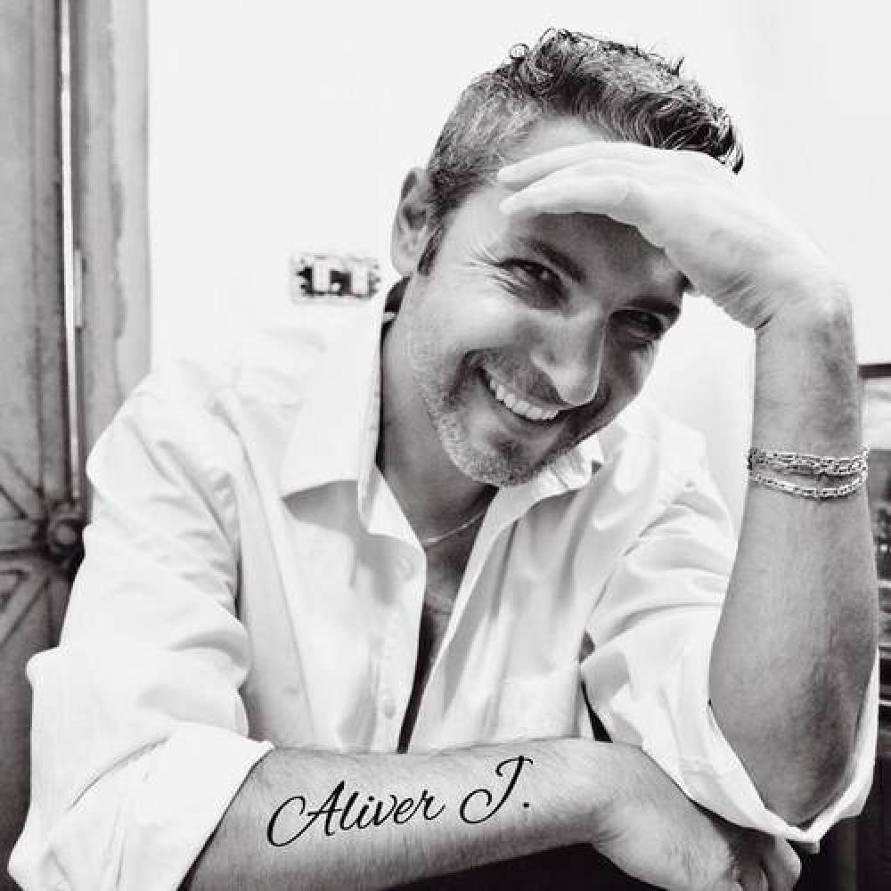 Aliver J.